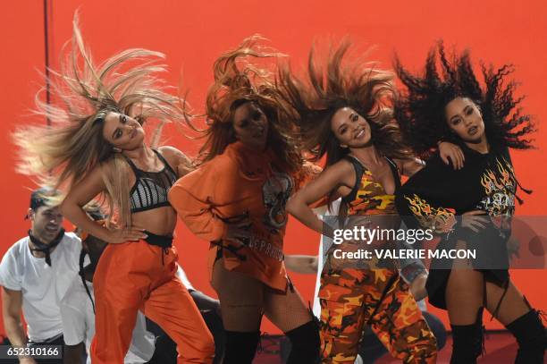 Perrie Edwards, Jesy Nelson, Jade Thirlwall, and Leigh-Anne Pinnock of the group "Little Mix" perform on stage at the 30th Annual Nickelodeon Kids'...