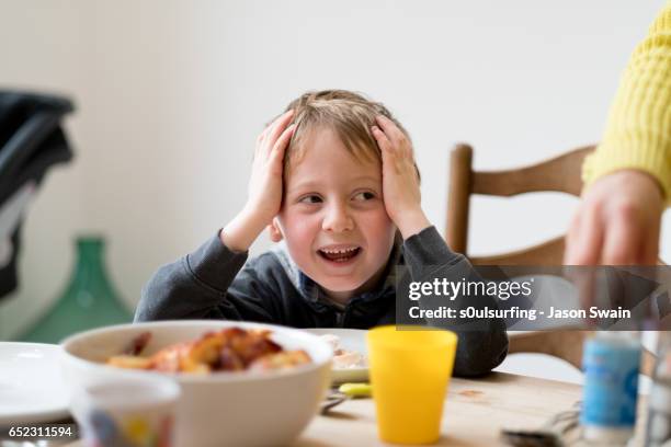 domestic scenes at family lunch - cowes stock pictures, royalty-free photos & images