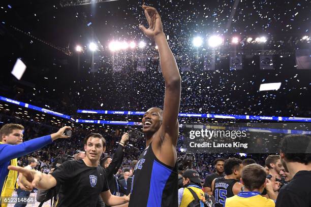 Nick Pagliuca and Harry Giles of the Duke Blue Devils celebrate following their 75-69 victory against the Notre Dame Fighting Irish during the ACC...