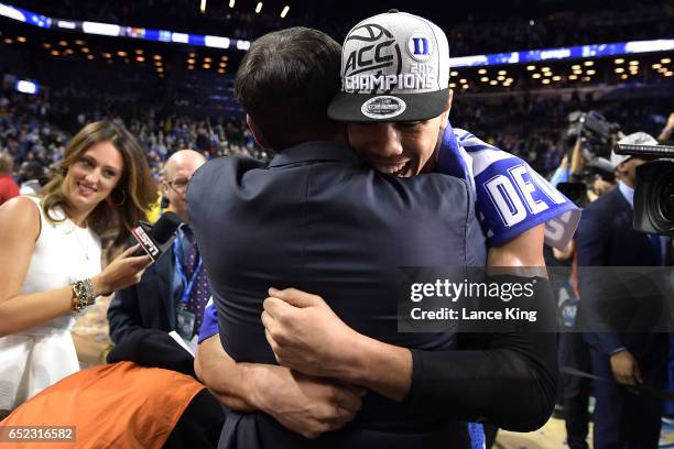 Head coach Mike Krzyzewski hugs Jayson Tatum of the Duke Blue Devils following their 75-69 victory against the Notre Dame Fighting Irish during the...