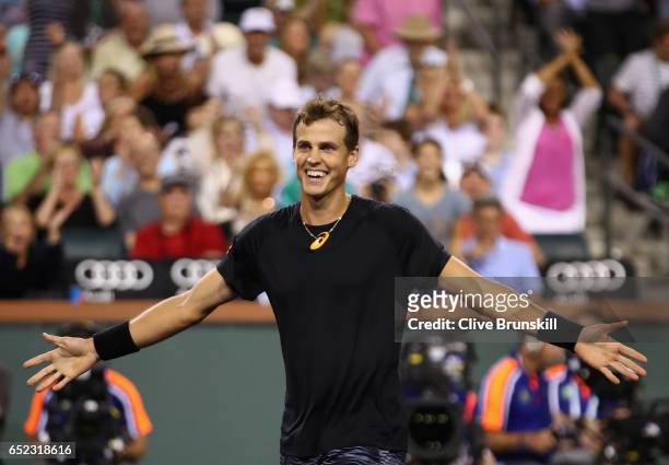 Vasek Pospisil of Canada celebrates match point against Andy Murray of Great Britain in their second round match during day six of the BNP Paribas...