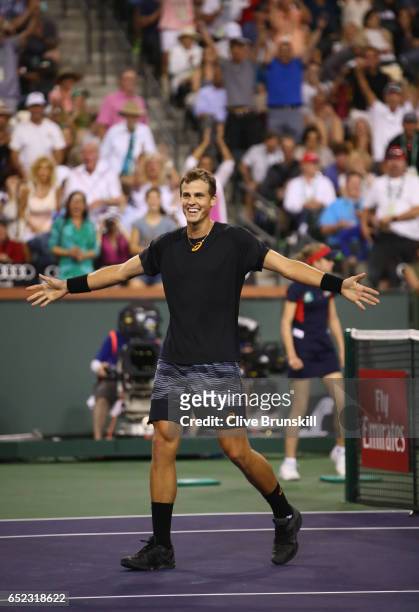 Vasek Pospisil of Canada celebrates match point against Andy Murray of Great Britain in their second round match during day six of the BNP Paribas...