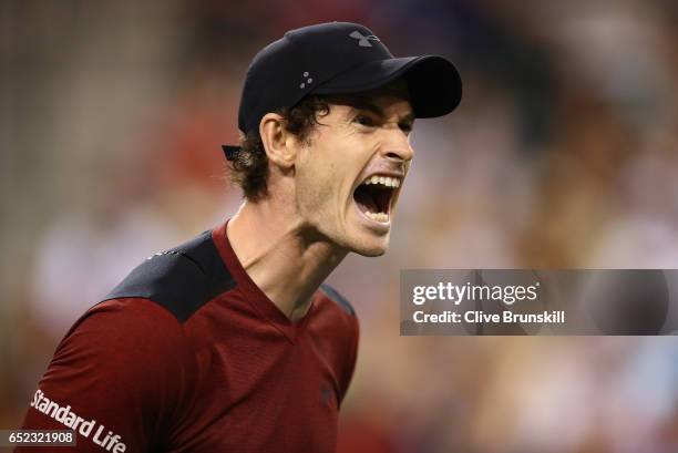 Andy Murray of Great Britain shows his frustration during his straight sets defeat by Vasek Pospisil of Canada in their second round match during day...