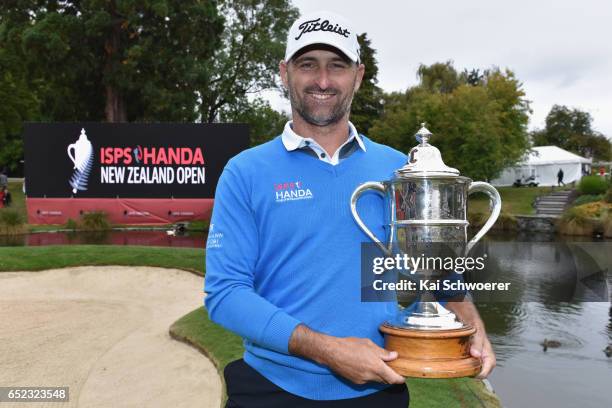 Michael Hendry of New Zealand poses with the Brodie Breeze Challenge Cup during day four of the New Zealand Open at Millbrook Resort on March 12,...