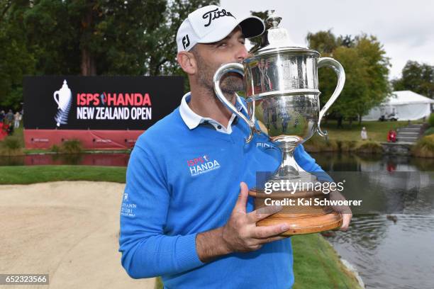 Michael Hendry of New Zealand poses with the Brodie Breeze Challenge Cup during day four of the New Zealand Open at Millbrook Resort on March 12,...