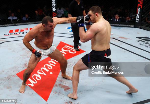 Mauricio Rua of Brazil punches Gian Villante in their light heavyweight bout during the UFC Fight Night event at CFO - Centro de Formaco Olimpica on...