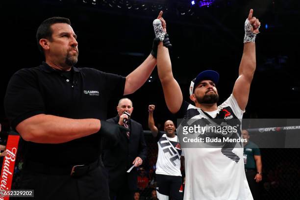 Kelvin Gastelum celebrates his knockout victory over Vitor Belfort of Brazil in their middleweight bout during the UFC Fight Night event at CFO -...