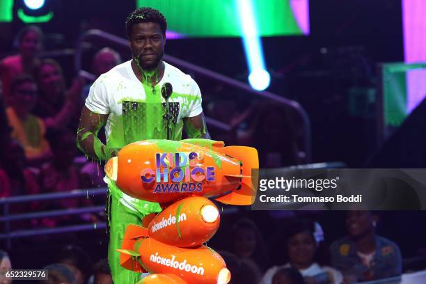 Actor Kevin Hart gets slimed onstage at the Nickelodeon's 2017 Kids' Choice Awards at USC Galen Center on March 11, 2017 in Los Angeles, California.