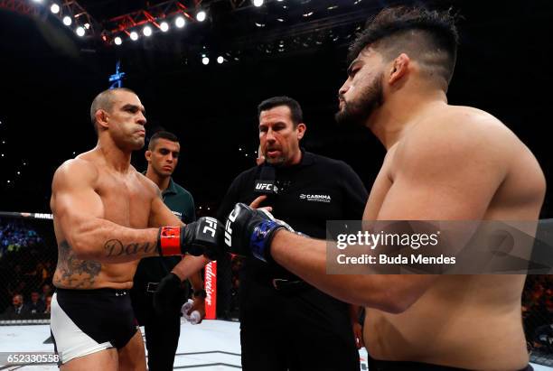Opponents Vitor Belfort of Brazil and Kelvin Gastelum face off prior to their middleweight bout during the UFC Fight Night event at CFO - Centro de...