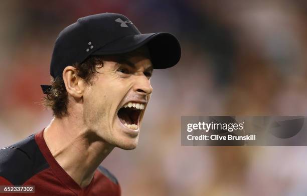 Andy Murray of Great Britain shows his frustration during his straight sets defeat by Vasek Pospisil of Canada in their second round match during day...