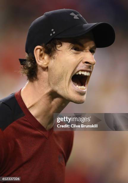 Andy Murray of Great Britain shows his frustration during his straight sets defeat by Vasek Pospisil of Canada in their second round match during day...