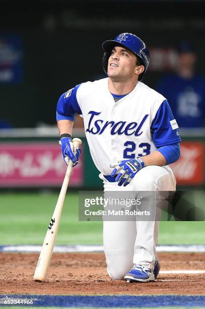 Sam Fuld of Israel falls in the seventh inning during the World Baseball Classic Pool E Game One between Cuba and Israel at Tokyo Dome on March 12,...