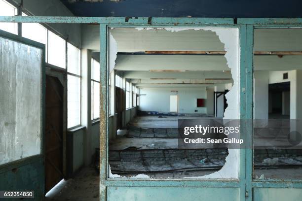 The former baggage claim hall at Nicosia International Airport stands decaying inside the buffer zone on the southern, Greek side of the divided city...