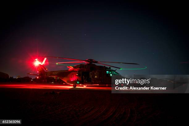 Helicopter stands on the airfield before take-off at Camp Castor on March 6, 2017 in Gao, Mali U.N.-led MINUSMA troops are assisting the Malian...