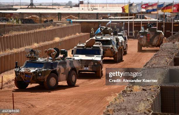 Members of the Bundeswehr, the German armed forces, check their vehicles at Camp Castor as part of the U.N.-led MINUSMA enforcement mission on March...