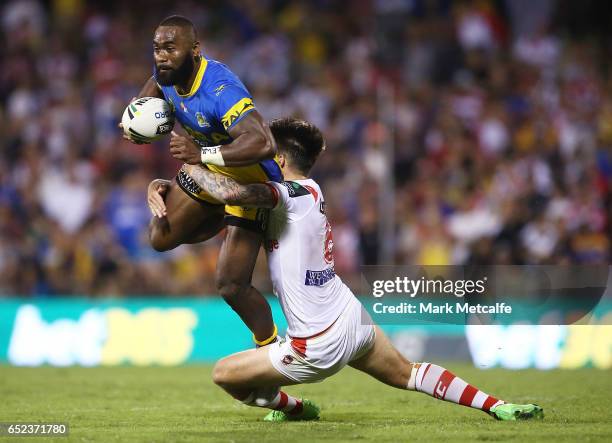 Semi Radradra of the Eels is tackled by Gareth Widdop of the Dragons during the round two NRL match between the St George Illawarra Dragons and the...