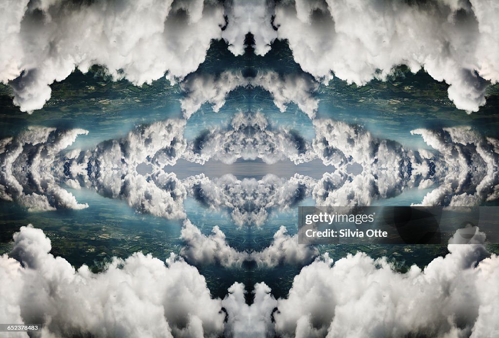 Surreal rorschach collage of dramatic clouds