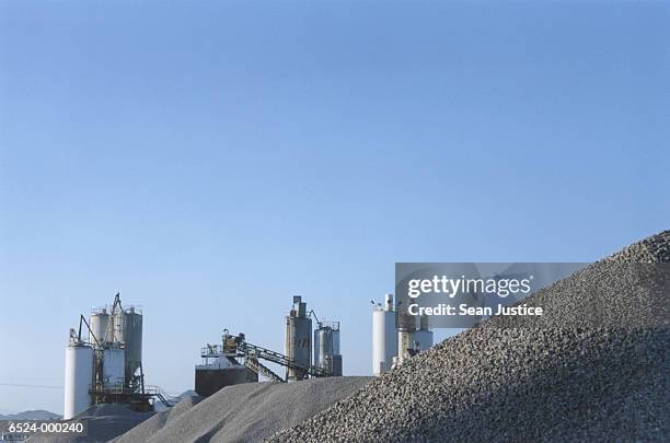 mounds of gravel - cement factory stock pictures, royalty-free photos & images