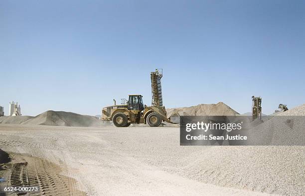 excavator at cement plant - cement factory stock pictures, royalty-free photos & images