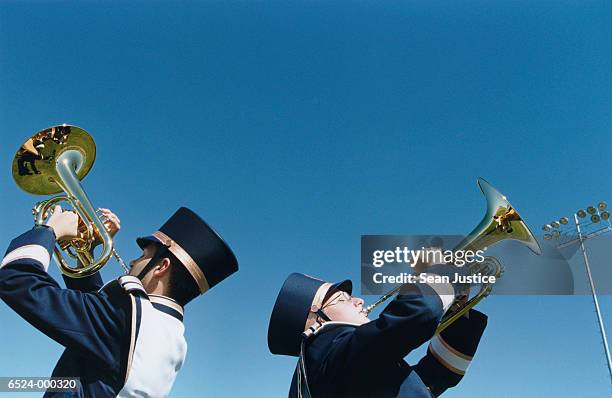 horn players in marching band - bläser stock-fotos und bilder