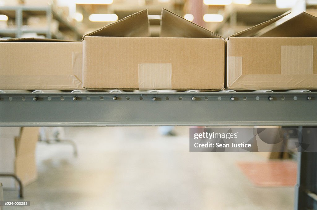 Boxes on Conveyor in Warehouse