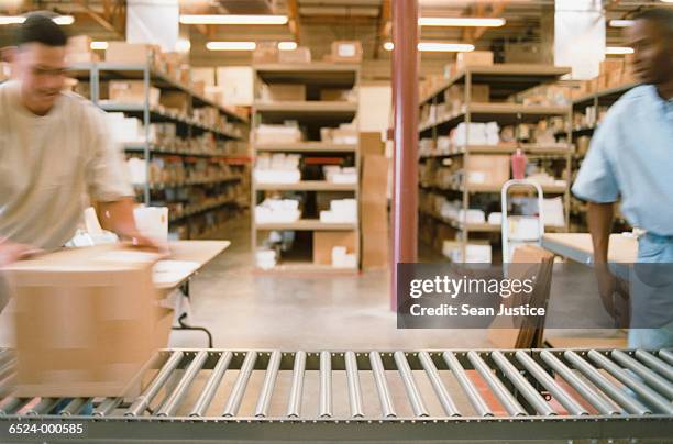 Repack Box Worker Rolling Box Photos and Premium High Res Pictures - Getty Images
