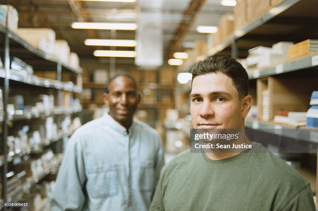 Warehouse Workers in Aisle