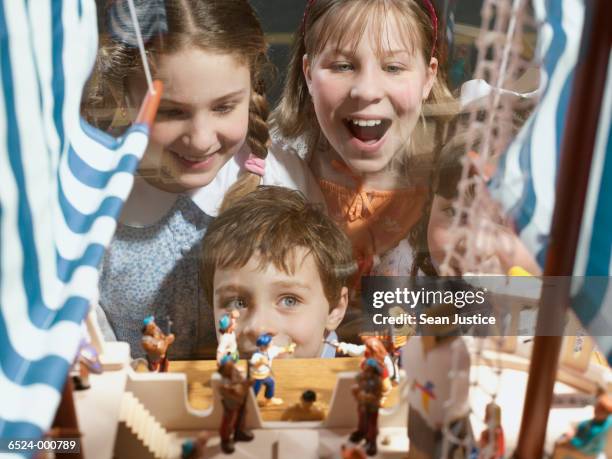 children and toy store window - toy store stock pictures, royalty-free photos & images