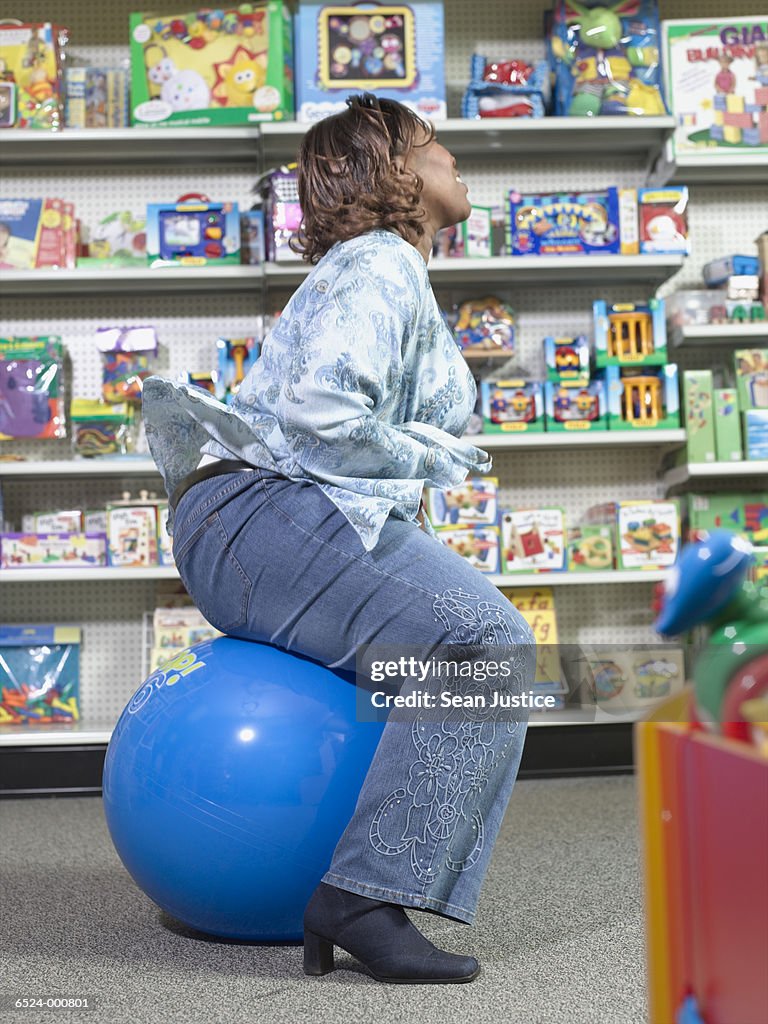 Woman using Space Hopper