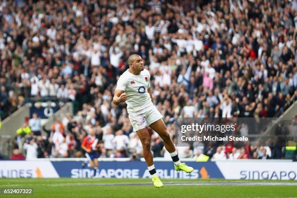 Jonathan Joseph of England celebrates scoring the opening try during the RBS Six Nations match between England and Scotland at Twickenham Stadium on...