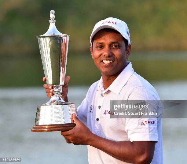 Chawrasia of India holds the winners trophy after final round of the Hero Indian Open at Dlf Golf and Country Club on March 12, 2017 in New Delhi,...