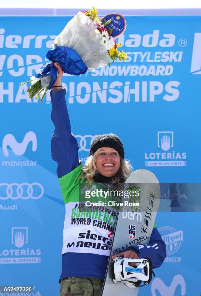 Gold Medalist Lindsey Jacobellis of the United States celebrates during the flower ceremony for the Women's Snowboard Cross on day five of the FIS...