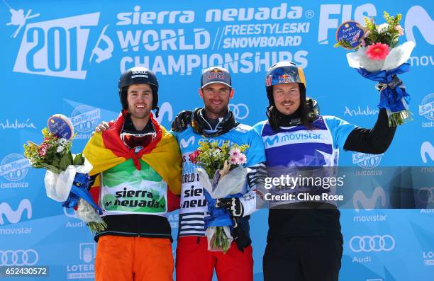 Bronze medalist Lucas Eguibar of Spain, gold medalist Pierre Vaultier of France and bronze medalist Alex Pullin of Australia pose during the flower...