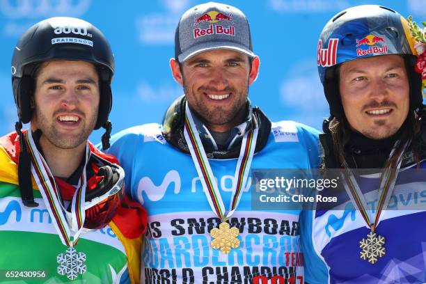 Bronze medalist Lucas Eguibar of Spain, gold medalist Pierre Vaultier of France and bronze medalist Alex Pullin of Australia pose during the medal...