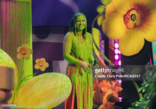 Singer-songwriter Demi Lovato gets slimed onstage at Nickelodeon's 2017 Kids' Choice Awards at USC Galen Center on March 11, 2017 in Los Angeles,...