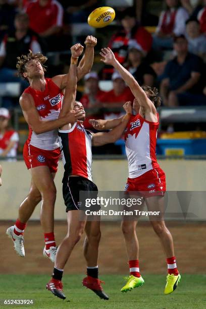 Dane Rampe of the Swans spoils Maverick Weller of the Saints during the JLT Community Series AFL match between the St Kilda Saints and the Sydney...