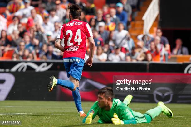 Duje Cop of Real Sporting de Gijon celebrate after scoring the 0-1 goal in the face of 01 Diego Alves of Valencia CF during the Spanish La Liga...