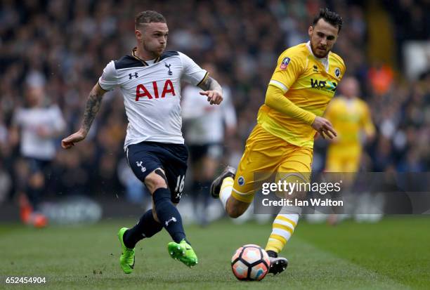 Kieran Trippier of Tottenham Hotspur is put under pressure from Lee Gregory of Millwall during The Emirates FA Cup Quarter-Final match between...