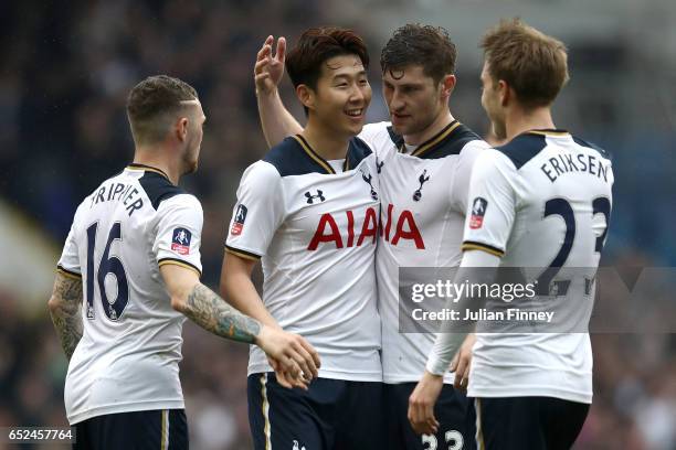 Heung-Min Son of Tottenham Hotspur scores his sides second goal with his Tottenham Hotspur team mates during The Emirates FA Cup Quarter-Final match...