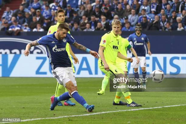 Guido Burgstaller of Schalke scores the second team goal during the Bundesliga match between FC Schalke 04 and FC Augsburg at Veltins-Arena on March...