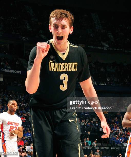 Luke Kornet of the Vanderbilt Commodores celebrates after a call against Florida in the SEC Tournament Quarterfinals at Bridgestone Arena on March...