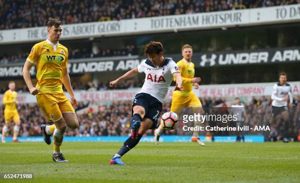 Son Heung-min of Tottenham Hotspur scores a goal to make it 3-0 during The Emirates FA Cup Quarter-Final match between Tottenham Hotspur and Millwall...
