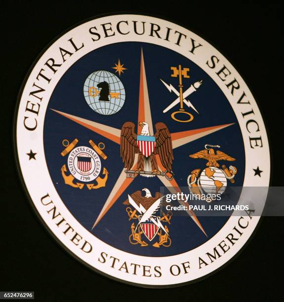 The seal of the Central Security Service hangs at the Threat Operations Center inside the National Security Agency in the Washington suburb of Fort...