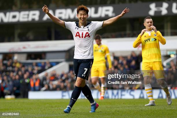 Heung-Min Son of Tottenham Hotspur celebrates as he scores their sixth goal and completes his hat trick during The Emirates FA Cup Quarter-Final...