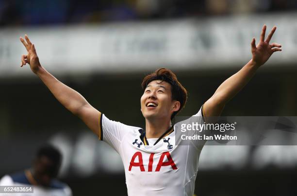 Heung-Min Son of Tottenham Hotspur celebrates as he scores their sixth goal and completes his hat trick during The Emirates FA Cup Quarter-Final...