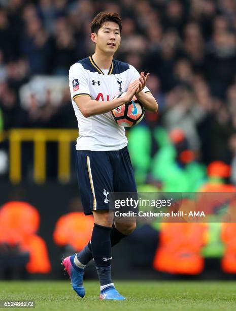 Hat-trick scorer Son Heung-min of Tottenham Hotspur with the match ball after The Emirates FA Cup Quarter-Final match between Tottenham Hotspur and...