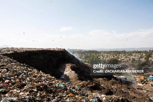 Photo taken on March 12, 2017 shows a view of the main landfill of Addis Ababa on the outskirts of the city, after a landslide at the dump left at...