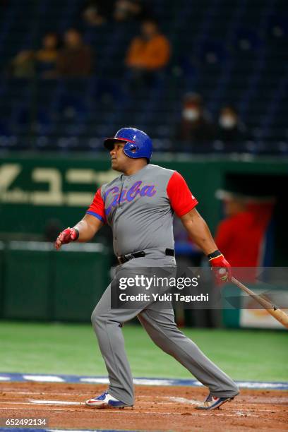 Alfredo Despaigne of Team Cuba hits a solo home run in the second inning during Game 1 of Pool E against Team Israel at the Tokyo Dome on Sunday,...