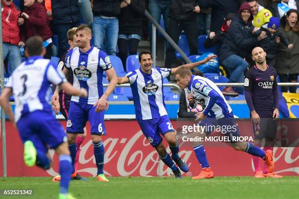Deportivo La Coruna's midfielder Alex Bergantinos celebrates a goal during the Spanish league footbal match RC Deportivo de la Coruna vs FC Barcelona...