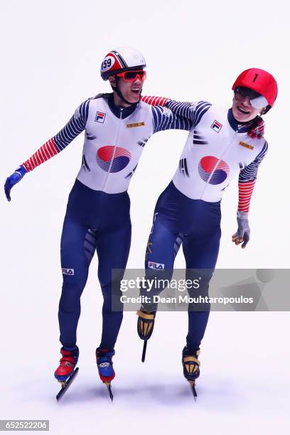 Seo Yi Ra of South Korea and Sin Da Woon of South Korea celebrate after they compete on day two in the 3000m Mens Super Final at ISU World Short...